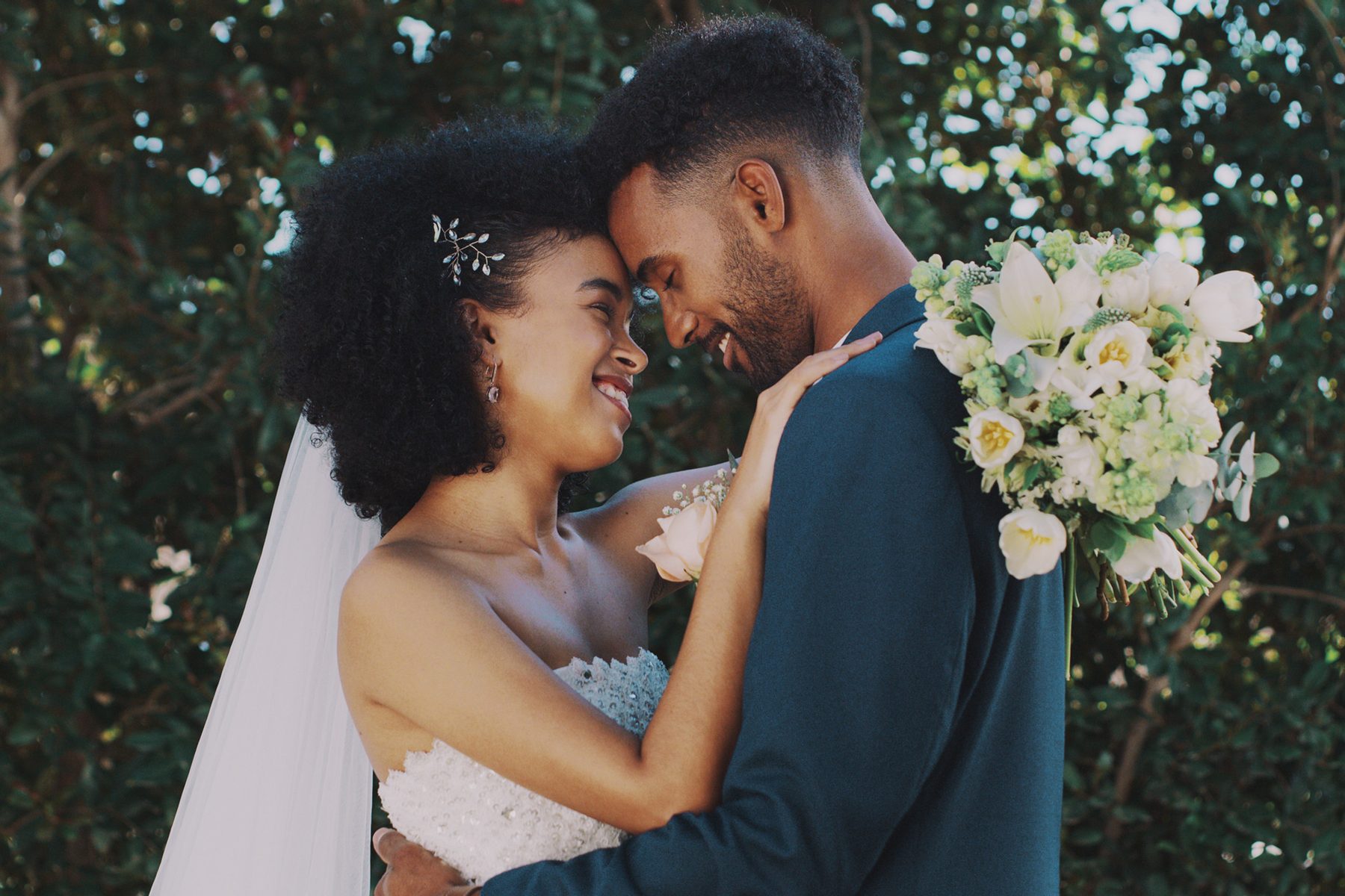 A couple in late golden light after the ceremony